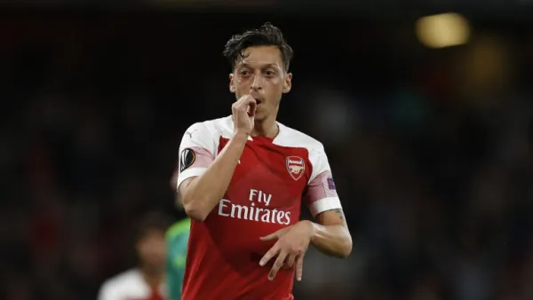 The German playmaker continues to split opinion, but a former Gunners team-mate has hailed his qualities and called for a sense of perspective