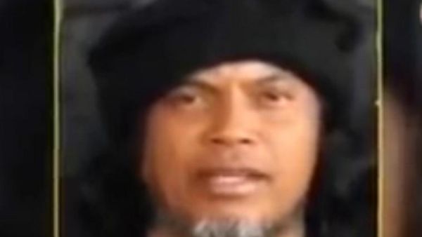 A member of the Philippines-based Abu Sayyaf militant group is seen in a file photo. The group is responsible for kidnapping foreigners and for numerous militant attacks in the Philippines. (File Photo)