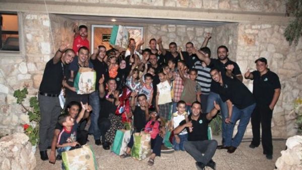 Starbucks employees with the SOS children
