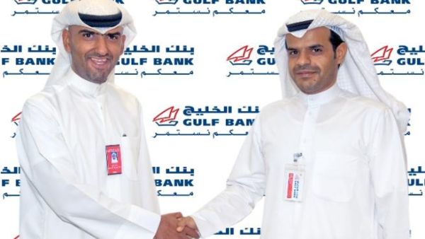Musaed Al Mazyed, Area Manager congratulating Al Danah weekly winner, Saad Meshal Mezyed Al-Mutairi