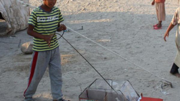 Kid playing at Ghor Al-Mazra’a