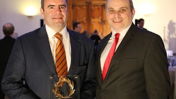 David Kerr, VP Etihad Cargo receives the award from Dr Kostas Iatrou, Managing Director, Air Transport News, during the presentation ceremony at the Araina Museum, Geneva David Kerr, VP Etihad Cargo receives the award from Dr Kostas Iatrou, Managing Director, Air Transport News, during the presentation ceremony at the Araina Museum, Geneva