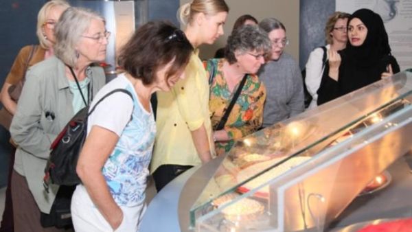 A group of female participants at the 2013 EAFL were given a guided tour