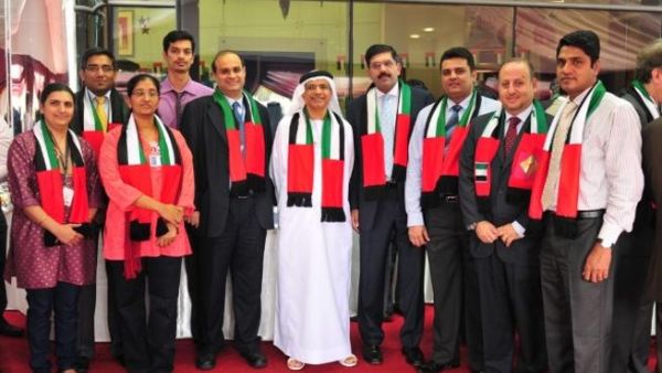 Abdulhamid Mohammed Saeed, Managing Director with FGB employees during the event