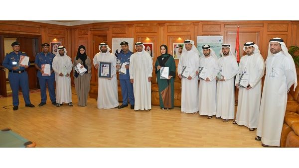 Ahmed Mahboob Musabih flanked by ideasUK awardees from DC