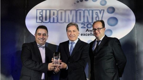 Andre Al Sayegh, CEO of FGB, Karim Karoui, Chief Financial Officer, First Gulf Bank, and Clive Horwood, Editor of Euromoney