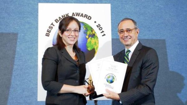 Ms. Dina Shoman, Executive Vice President of Branding at Arab Bank accepting the awards Ms. Dina Shoman, Executive Vice President of Branding at Arab Bank accepting the awards