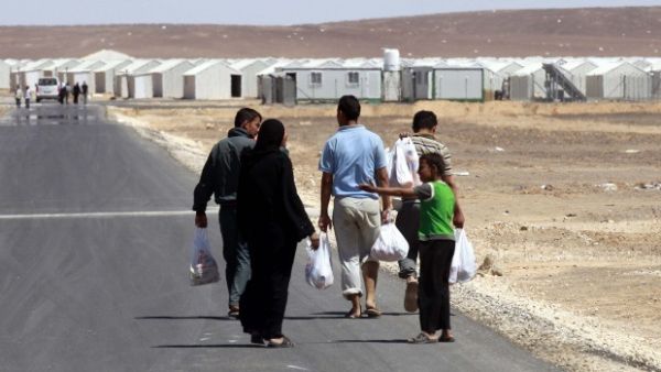 The center will allow Syrian refugees to obtain a one-month leave from the camp and work permit to pursue job opportunities outside the camp. (AFP/ File)