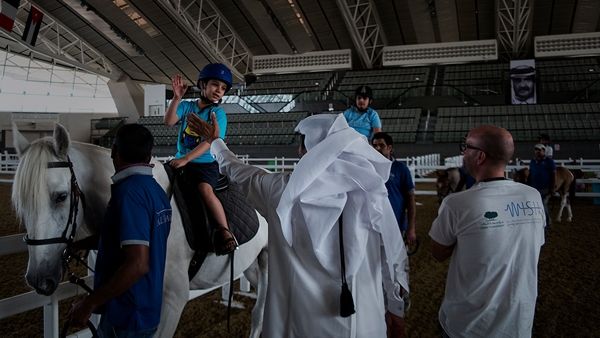 أطفال من رابطة قطر لأسر التوحد يشاركون في برنامج ركوب الخيل بمربط الشقب، الذي نظمه مؤتمر القمة العالمي للإبتكار في الرعاية الصحية (ويش). أطفال من رابطة قطر لأسر التوحد يشاركون في برنامج ركوب الخيل بمربط الشقب، الذي نظمه مؤتمر القمة العالمي للإبتكار في الرعاية الصحية (ويش).