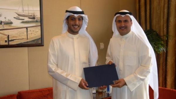 NUKS, Union President, Fahad T. Al Sebaie receives the sponsorship cheque from NBK Group Deputy CEO Isam Al Sager