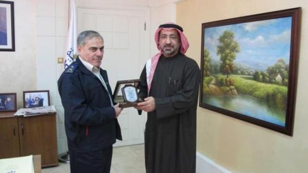 Ahmed Butti Ahmed exchanging gifts with Galib Al-Saraera, Director General of the Jordanian Customs Ahmed Butti Ahmed exchanging gifts with Galib Al-Saraera, Director General of the Jordanian Customs
