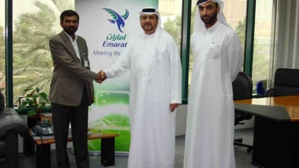 Abdulrahman Qassim Al Ali after the signing of the agreement with Anwar Talkadour in presence of Dhahi Al Muheiri Abdulrahman Qassim Al Ali after the signing of the agreement with Anwar Talkadour in presence of Dhahi Al Muheiri