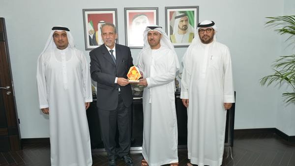 Abdulla Al Khaja receiving the award from Mohammed Sulman in the presence of Edris Behzad and Khalil Saqr
