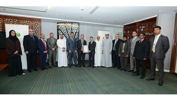 D.r Adnan Chilwan, GCEO, and HR officials, DIB recieve ISO 90012008 Quality Management System certification