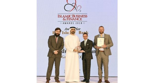 Dr. Adnan Chilwan, Group CEO, DIB, receives the award during the ceremony. Dr. Adnan Chilwan, Group CEO, DIB, receives the award during the ceremony.