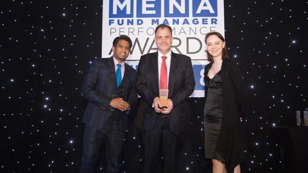 Dr. Husayn Shahrur, NBK Capital’s Managing Director of Regional receiving the award. Dr. Husayn Shahrur, NBK Capital’s Managing Director of Regional receiving the award.