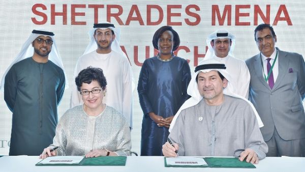 Sami Al Qamzi, Director General of DED, and Arancha González, Executive Director of the International Trade Centre with representatives during the signing ceremony.