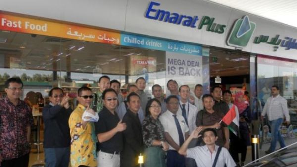 Delegation in front of one of the Convenience Stores
