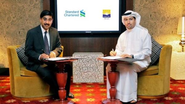 Arif Amiri, Chief Executive Officer, Emaar Retail and Pramod Veturi, Acting Head of Consumer Banking, Standard Chartered Bank UAE during the signing ceremony