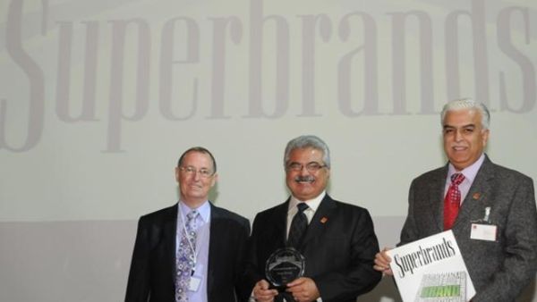 Mr. Mike English, Mr. Deepak Babani and Mr. Niranjan Gidwani at the Superbrands Award Ceremony 2012 in Dubai, UAE