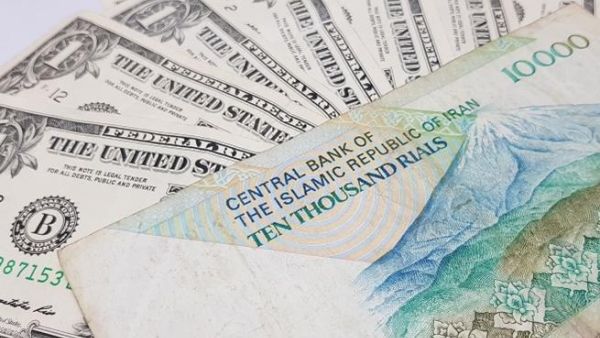 The currency was trading at about 110,000 rials per US dollar on the unofficial market on Sunday. (Shutterstock)