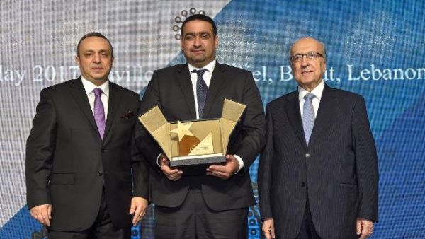 Talib receives the Award from Fattouh and WUAB Chairman, Dr. Joseph Torbey. Talib receives the Award from Fattouh and WUAB Chairman, Dr. Joseph Torbey.
