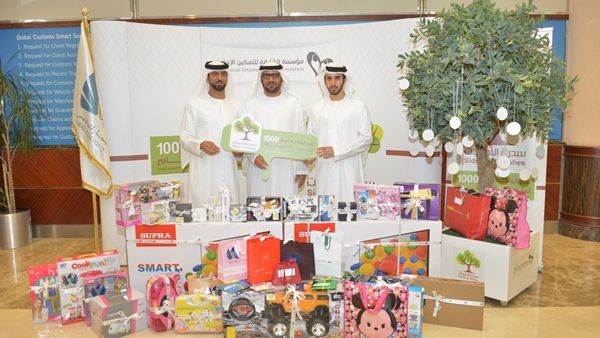 Khalil Saqer and two CSR representatives of Dubai Customs