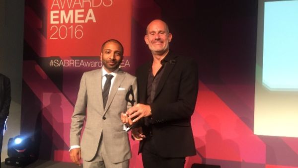 OPR EMEA CEO Michael Frohlich receiving the trophy OPR EMEA CEO Michael Frohlich receiving the trophy