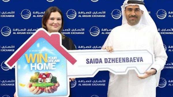 Rashed Al Ansari, General Manager of Al Ansari Exchange and Saida Dzheenbaeva, the winner of the Dream Home.