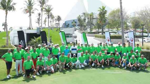 James Voce and Parvez Merchant, Winners of the first qualifying round of XCGC 2015 lift the trophy at Dubai Creek Golf and Yacht Club, Dubai