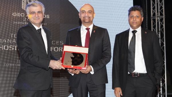 Yasser Zeineldin, CEO, eHosting DataFort (center) receiving the Top Managed Service Provider of the Year Yasser Zeineldin, CEO, eHosting DataFort (center) receiving the Top Managed Service Provider of the Year