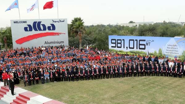 Alba management, directors and staff celebrate the record. Alba management, directors and staff celebrate the record.