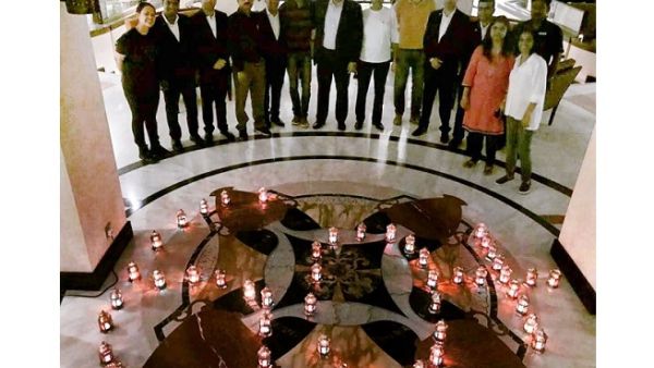 A brief ceremony was organised at the hotel garden where team members and guests gathered to witness the switching off of lights signaling the start of the Earth Hour movement A brief ceremony was organised at the hotel garden where team members and guests gathered to witness the switching off of lights signaling the start of the Earth Hour movement