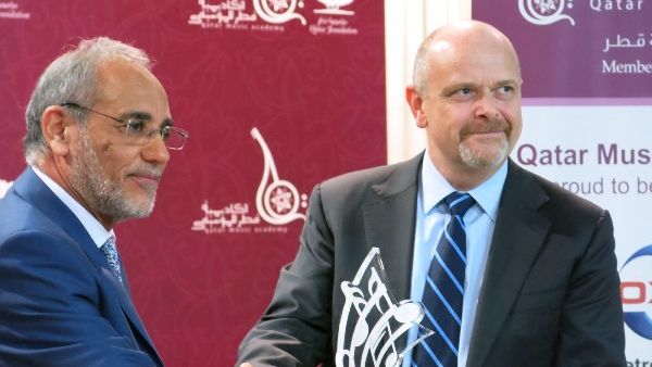 Dr. Abdul Ghafour Al Heeti, Principal of Qatar Music Academy, with Mr. Steve Kelly, President and General Manager of Occidental Petroleum Qatar Ltd. Dr. Abdul Ghafour Al Heeti, Principal of Qatar Music Academy, with Mr. Steve Kelly, President and General Manager of Occidental Petroleum Qatar Ltd.