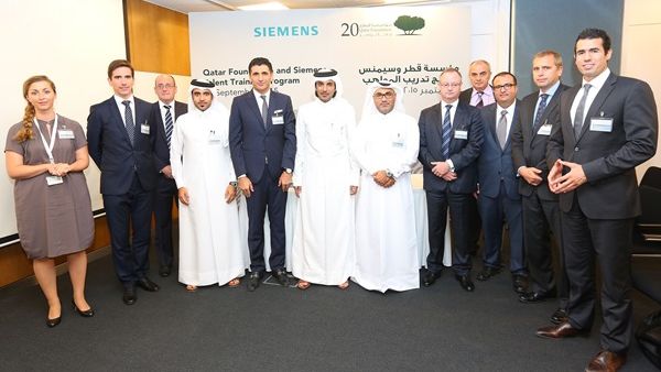 Abdurrahman Fatih Sakiz, Chief Executive Officer, Siemens WLL, and Fahad Al Qahtani, Group Executive Director of Qatar Foundation Administration, along with a selection of senior officials from Qatar Foundation and Siemens WLL Qatar