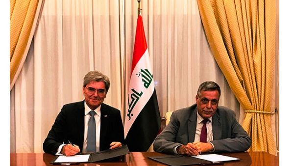 Qasim Al-Fahdawi, Minister of Electricity, and Joe Kaeser, president and CEO of Siemens AG. (Trade Arabia)