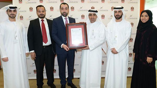 Hamad Obaid Al Mansoori, TRA director general, received the certificates during a special meeting with Ahmad AlKhatib, director general of the British Standards Institute in the Middle East, in TRA’s office. (Trade Arabia)