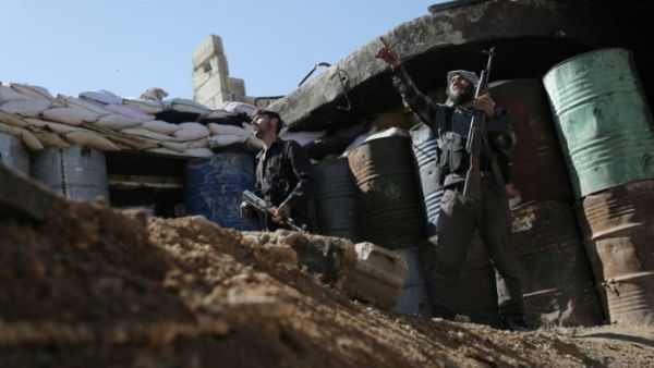 Rebel fighters in Ghouta, February 2016 (AFP/Amer Almohibany)