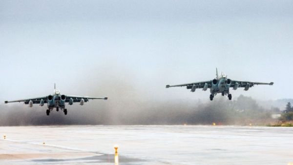 Russian Sukhoi Su-25 ground attack aircraft take off from the Hmeimim military base in Latakia province, Syria on March 16, 2016. (AFP/Vadim Grishankin)
