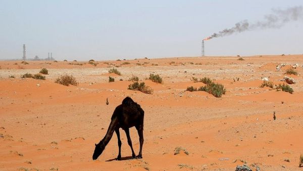 A flame from a Saudi Aramco oil installation known as Pump 3 is seen in the desert near the oil-rich area of Khouris, 160 km east of Riyadh. (AFP)