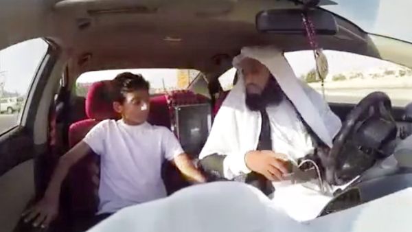 A Saudi man, posing as a taxi driver, filmed passengers reacting to the threat of suicide bombing when he revealed a fake explosive belt. (YouTube)