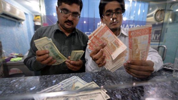Remittances by foreign workers have witnessed a steady fall in recent months as banks in Kingdom reported a gradual decline in foreign remittances. (AFP/ File)