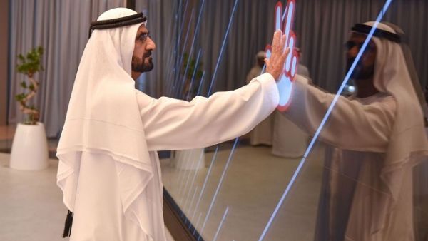 Sheikh Mohammed during the launch of a new government centre staffed entirely by smart robots. (WAM)
