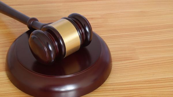 The defendant is accused of raping the woman at his family home while his parents were in the house (Shutterstock/File)