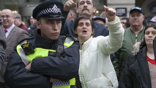 Far-right demonstration in London, UK ,01 Apr 2017 Britain First supporter. EDL and Britain First both hold demonstrations in London, opposed by anti-fascist groups including Unite Against Fascism . 