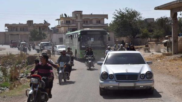 خروج 100 مسلح من حي الوعر في حمص