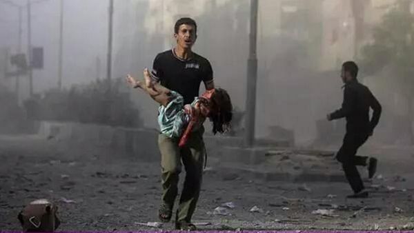 The Syrian government has for years been accused of dropping crude barrel bombs on civilian areas, most recently in the Damascus suburb of Douma. (AFP/File)