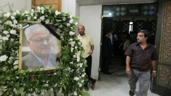 صورة للاسعد خلال مجلس عزاء له اقامته مديرية الاثار والمتاحف برعاية وزارة الثقافة في متحف دمشق الوطني
