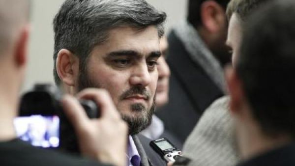 محمد علوش كبير المفاوضين في وفد المعارضة السورية الى جنيف