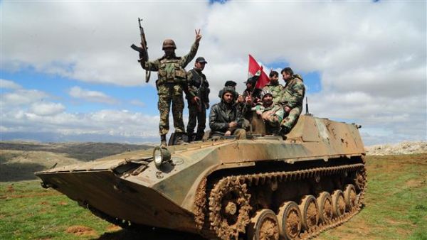 A handout picture released by the Syrian Arab News Agency (SANA) on March 31, 2015 shows Syrian troops in the mountains surrounding the city of Zabadani, some 50 km northwest of the Syrian capital, Damascus. (AFP/File)